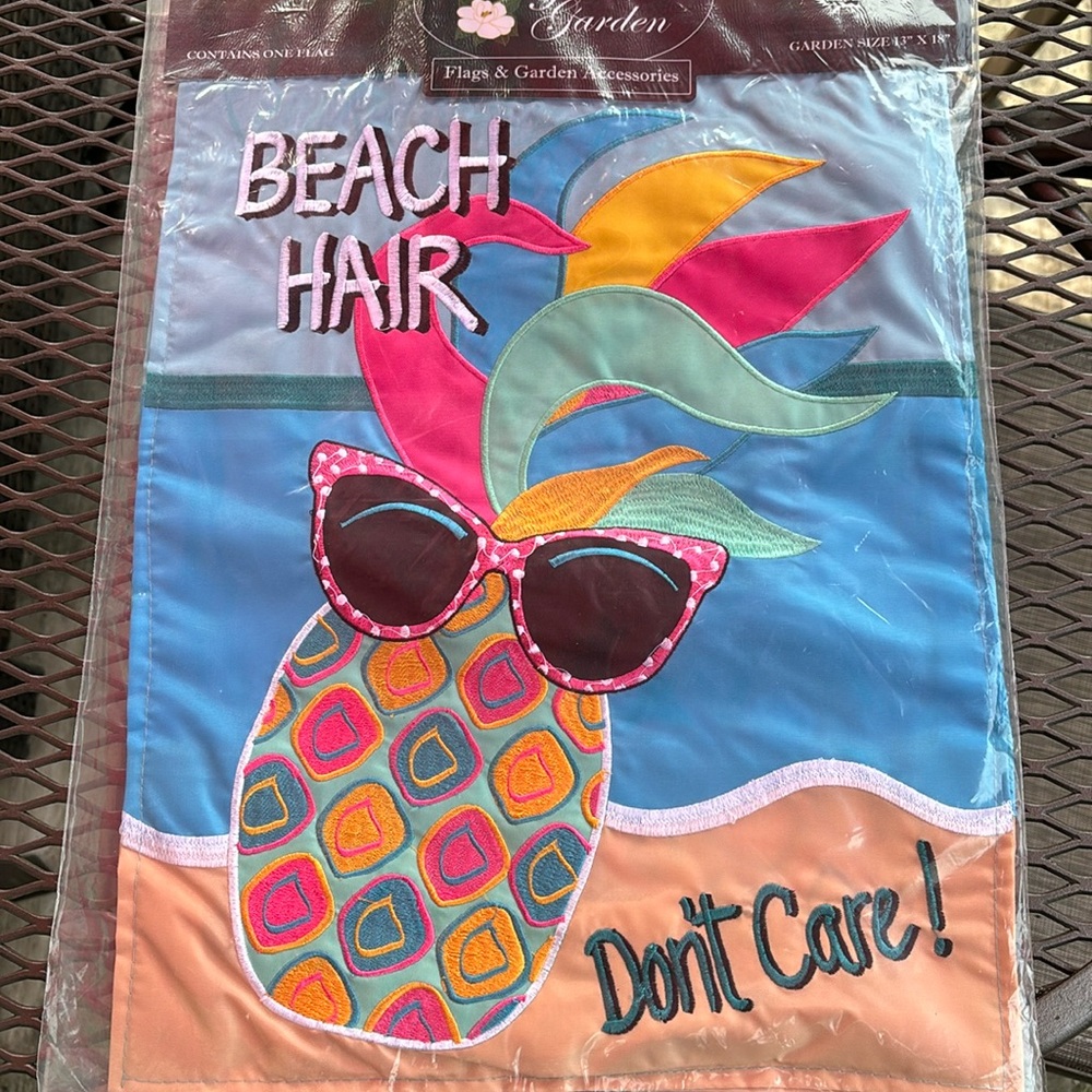 Fun bright colored “Beach Hair Don’t Care” Garden Flag